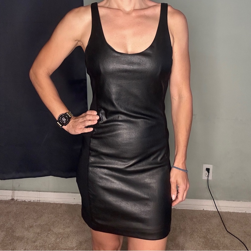 Free people Faux leather black mini dress.